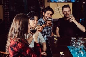 Friends enjoying beer at a Niagara Falls pub
